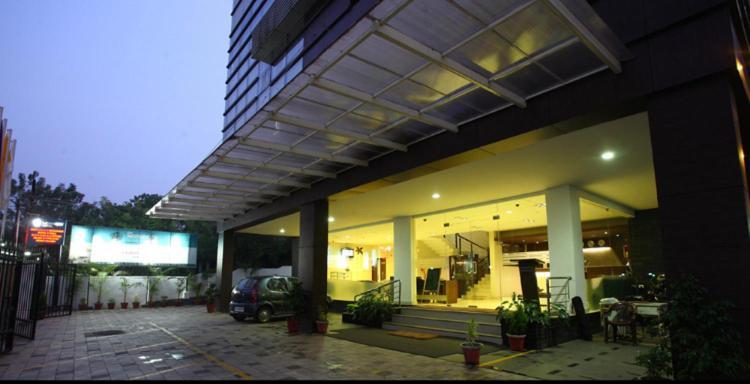 Hotel Monarch Kozhikode Buitenkant foto